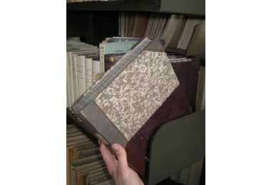 Bookbinding discoloured by light.